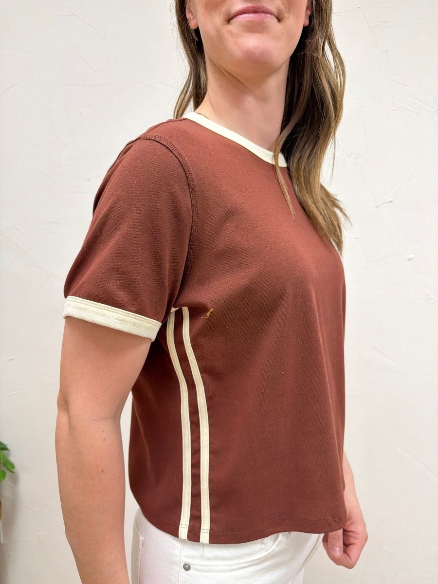 Side angle view of The Cait Top showing relaxed shape and sleeve detail — Three:Twelve Boutique