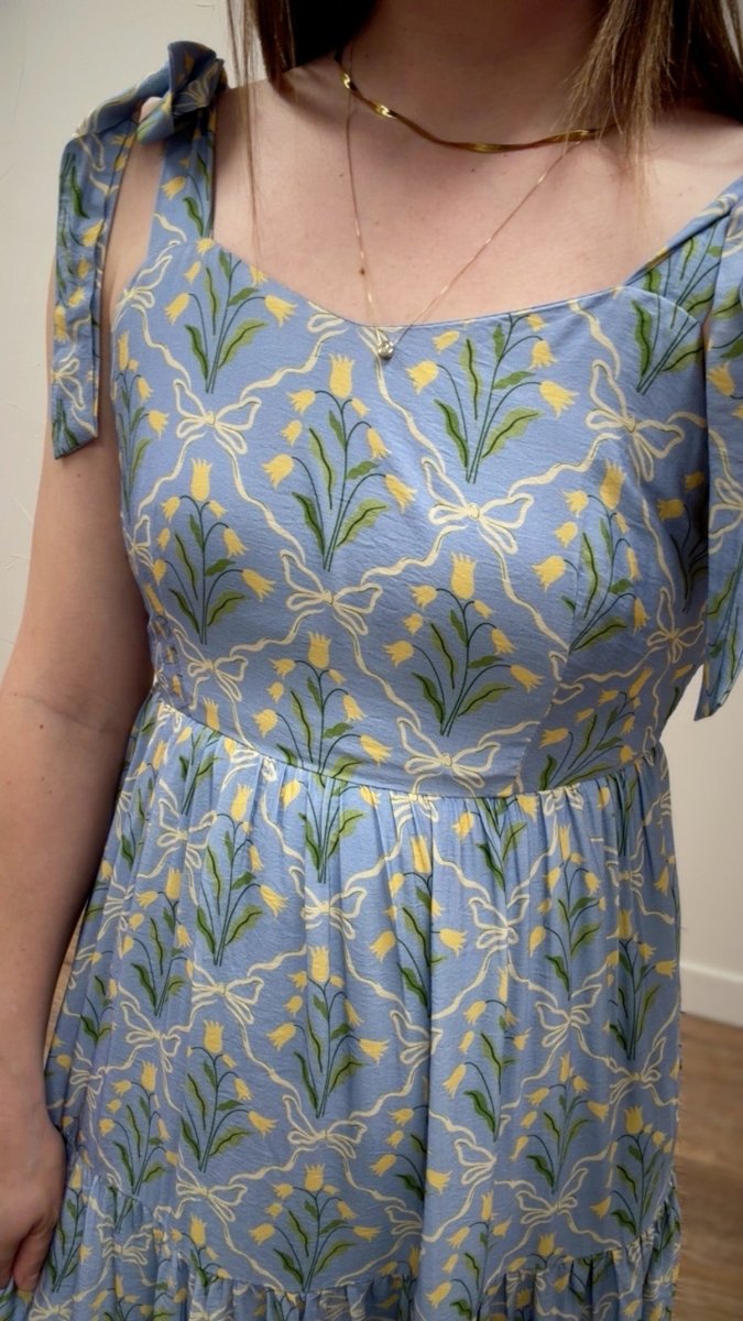 Close up detail of fabric and neckline area on The Francine Dress — Three Boutique
