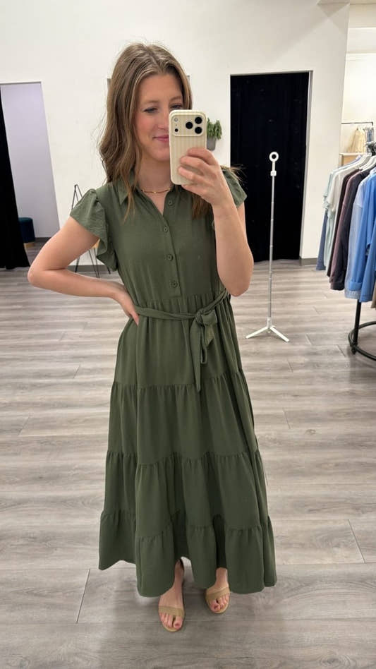 Front view of model wearing The Goldie Dress showing button front and waist tie — Three:Twelve Boutique