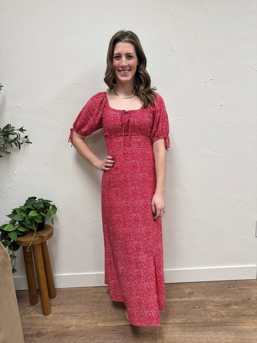 Lifestyle shot of model wearing The Jamie Dress in styled setting — Three:Twelve Boutique (to be confirmed from image)