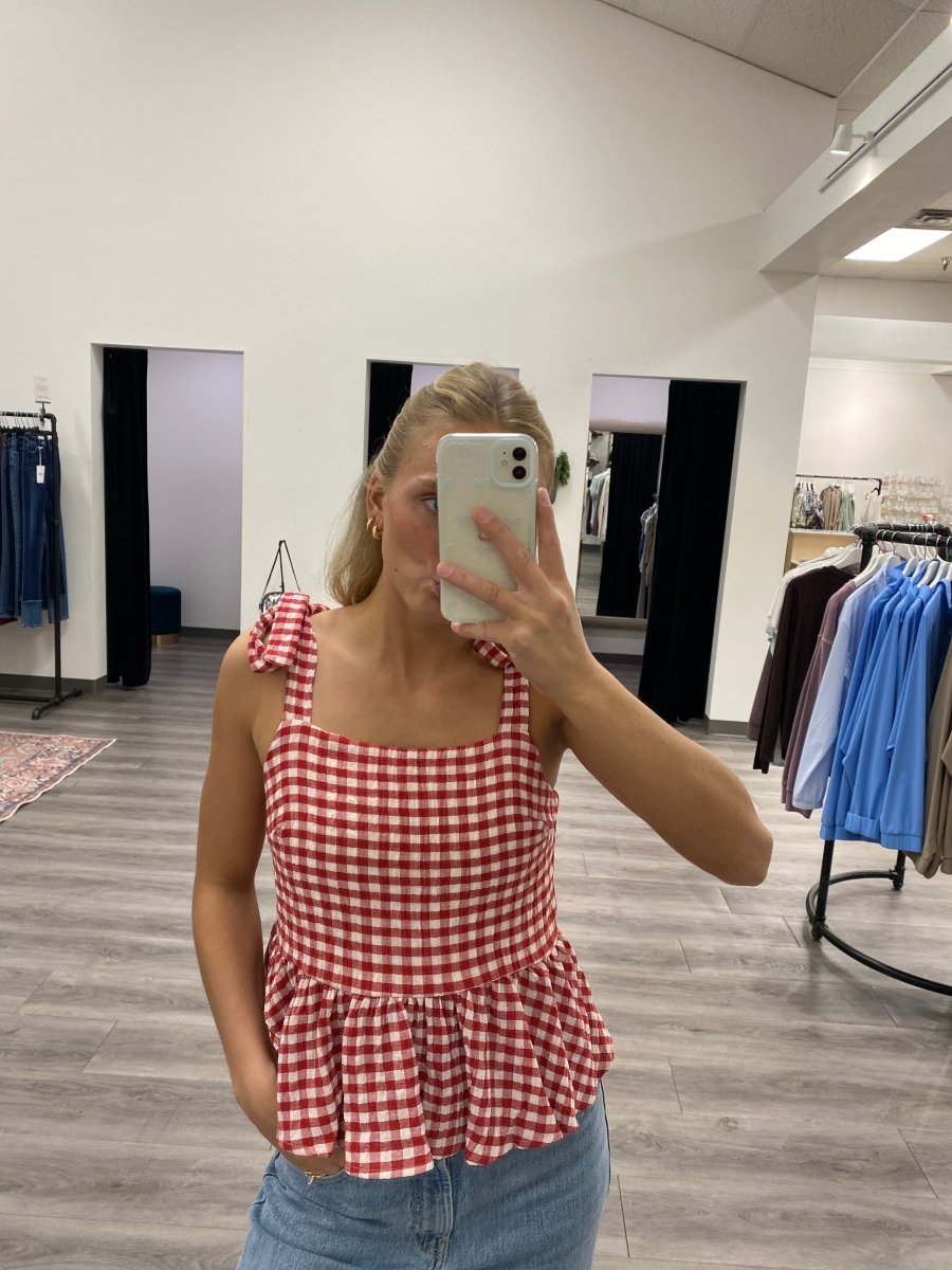 Front view of model wearing red Tie Shoulder Tank Top showing adjustable tie straps — Three:Twelve Boutique