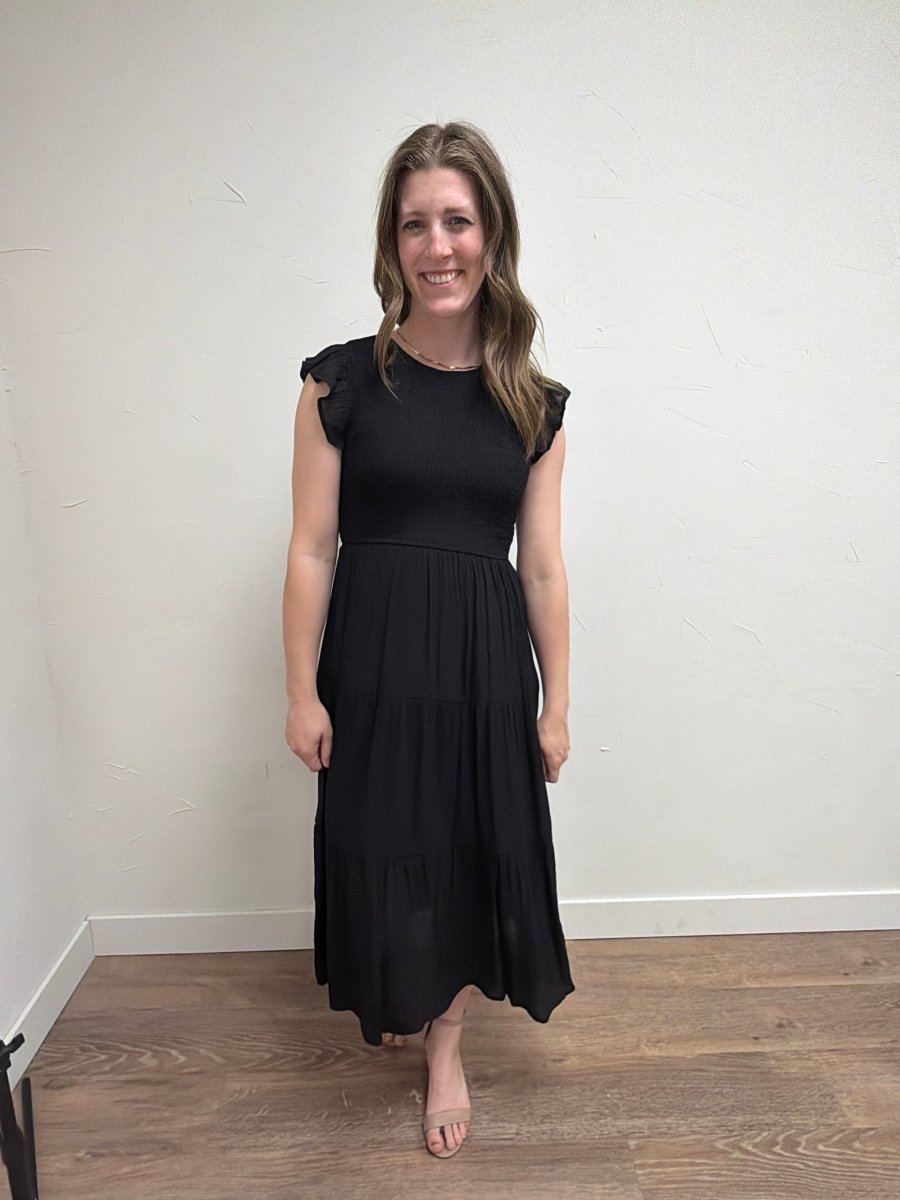 Front view of model wearing Tiered Smocked Short Sleeve Midi Dress for Women