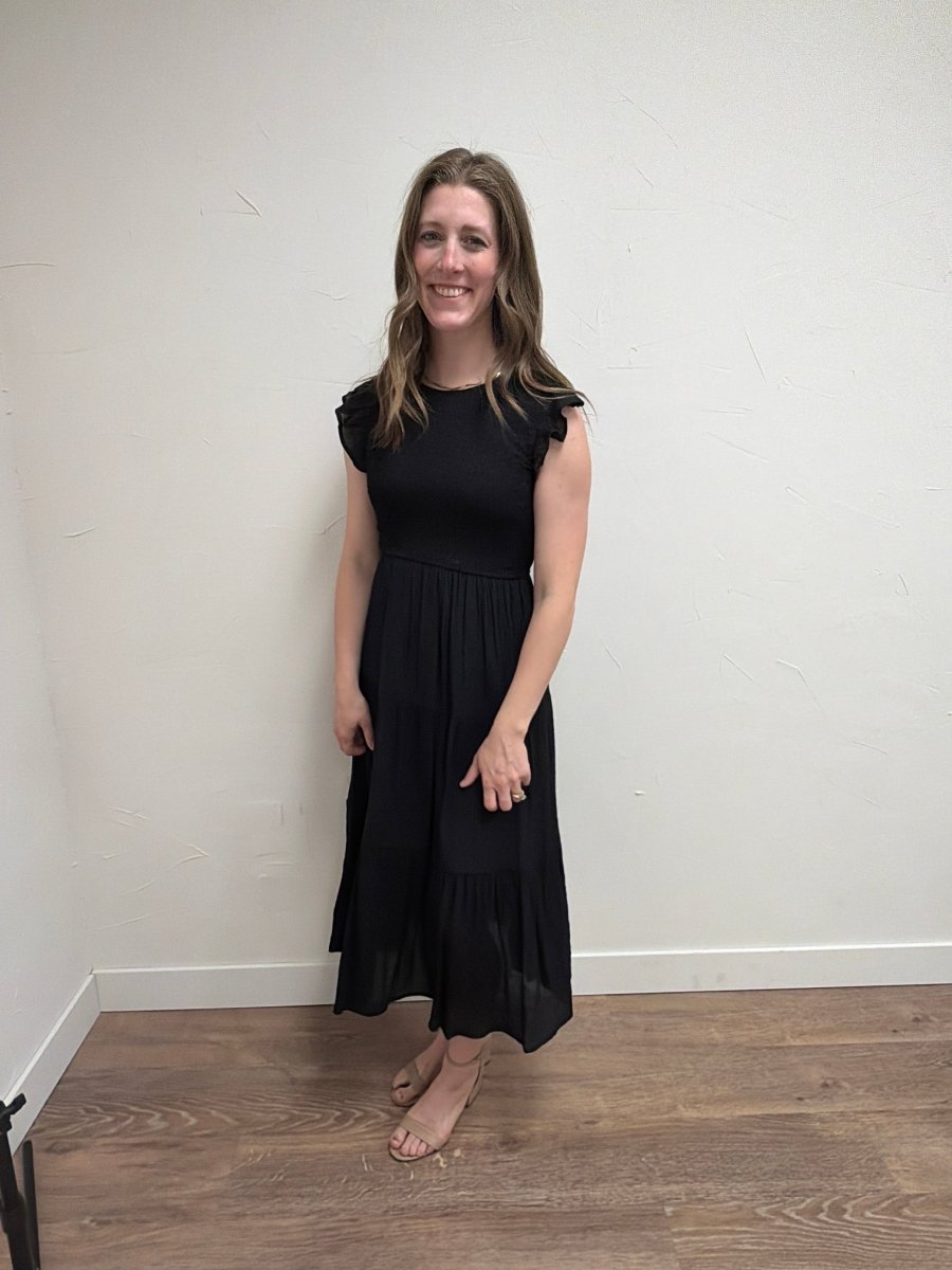 Full-length view of model wearing Tiered Smocked Short Sleeve Midi Dress for Women