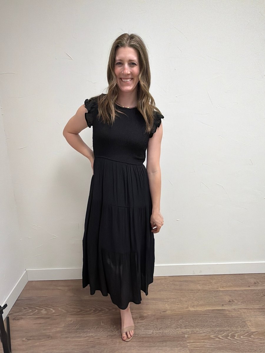 Full-length view of model wearing Tiered Smocked Short Sleeve Midi Dress for Women