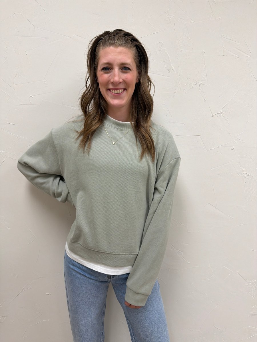 Front view of model wearing Twofer faux layered sweatshirt — Three:Twelve Boutique