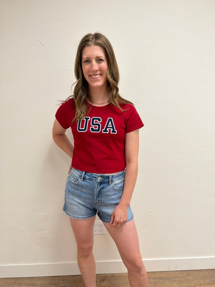 Front view of model wearing USA Short Sleeve Baby Tee — Three Boutique