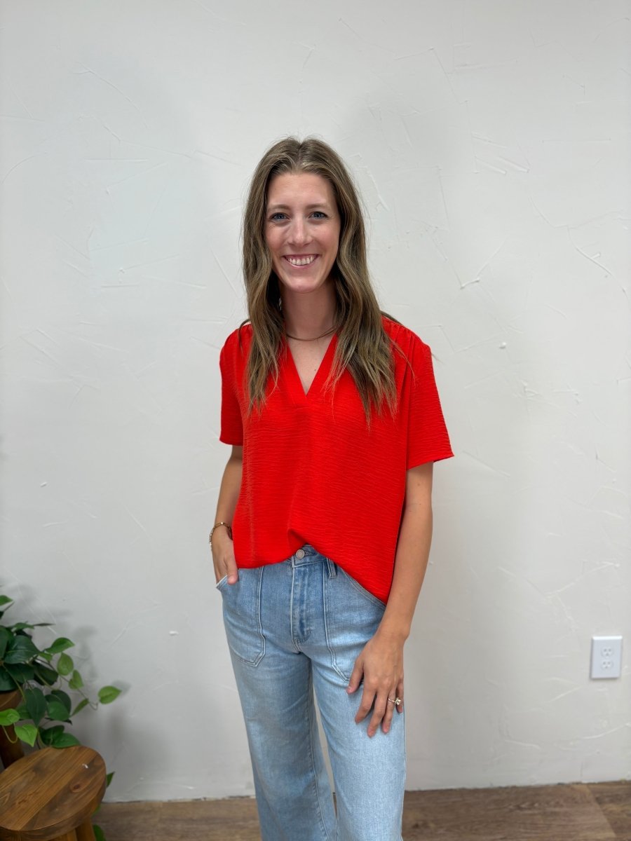 Front view of model wearing V neck dress shirt showing relaxed fit — Three:Twelve Boutique