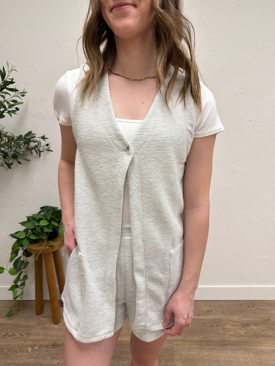 Close up of fabric texture and V neck detail — Three:Twelve Boutique
