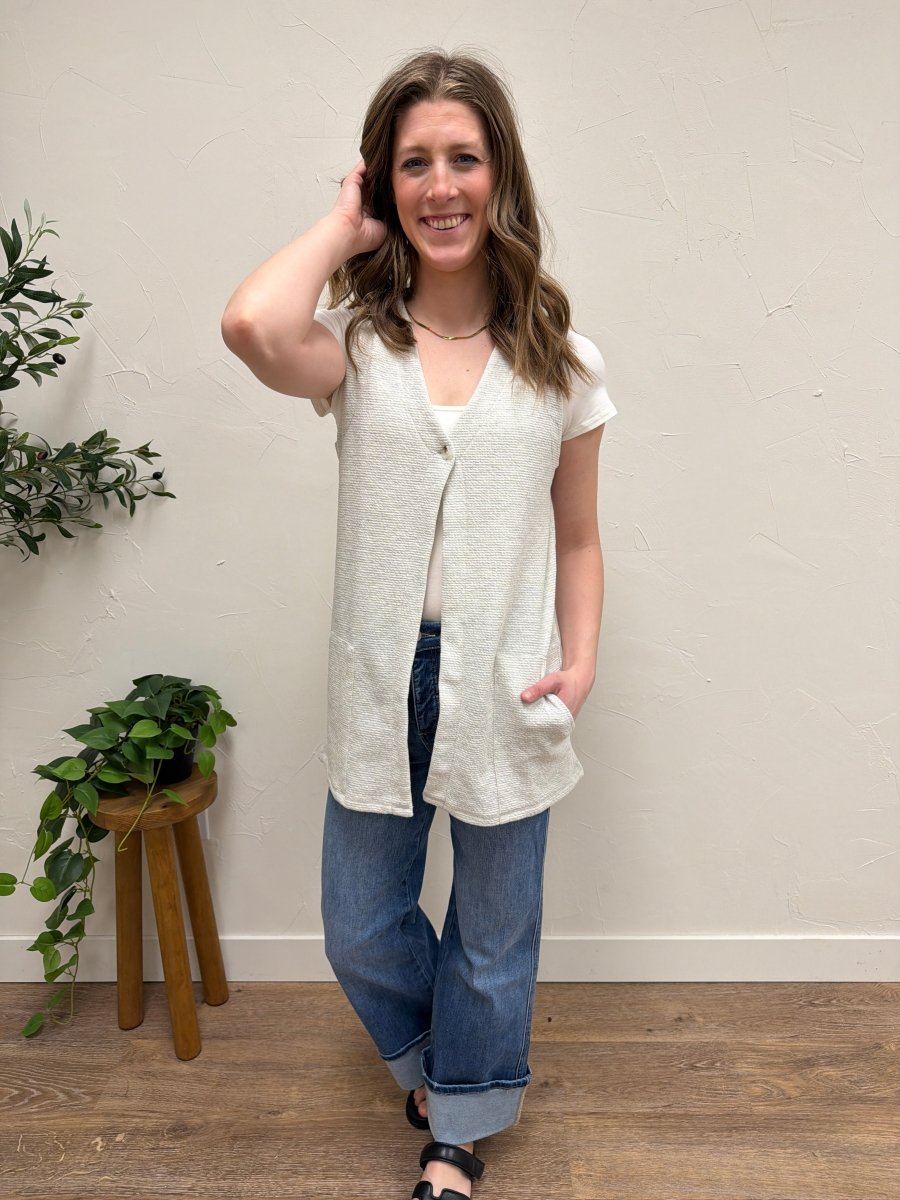 Lifestyle shot of model wearing tunic top styled with casual outfit — Three:Twelve Boutique