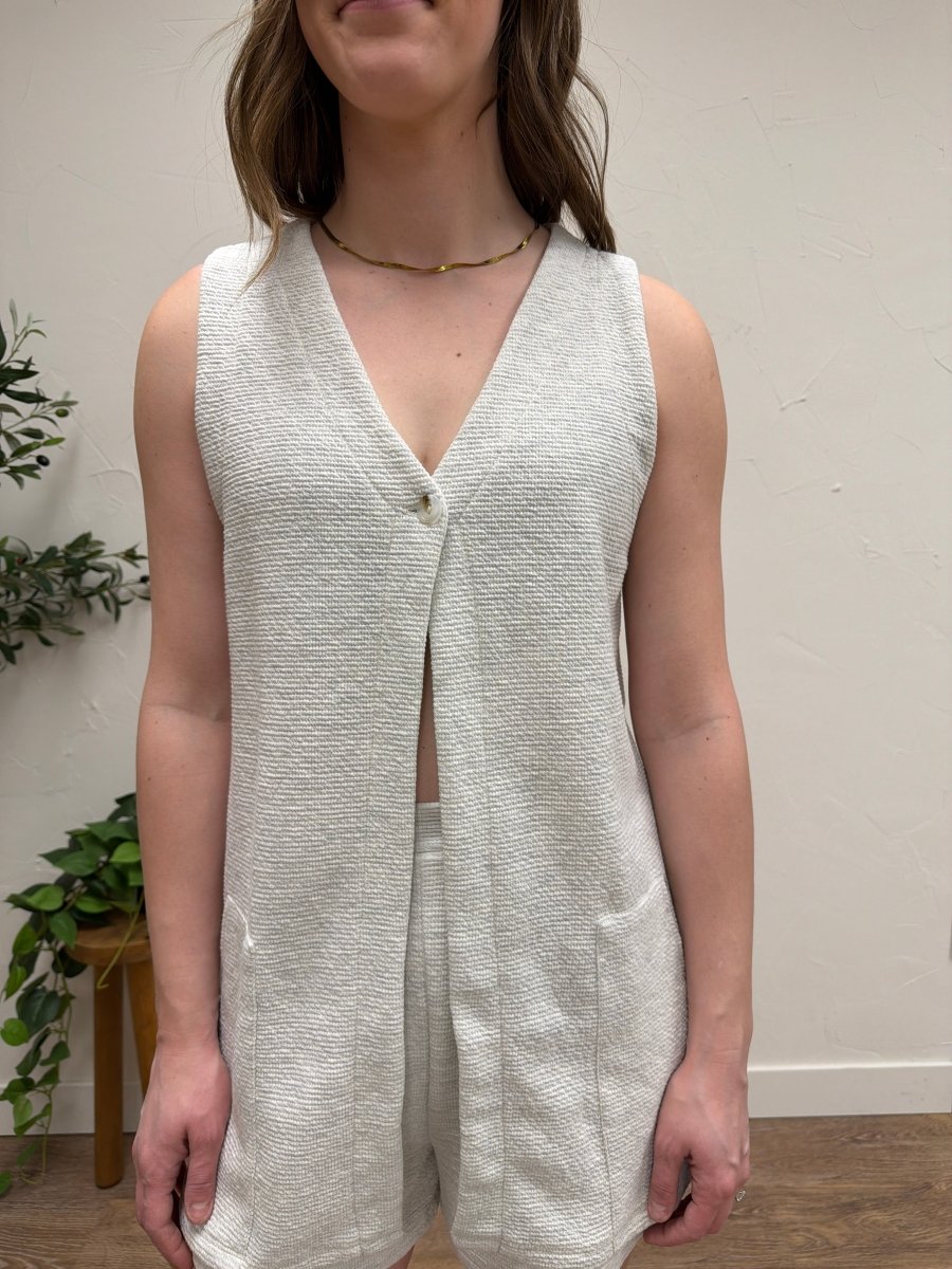 Close up of fabric texture and V neck detail — Three:Twelve Boutique