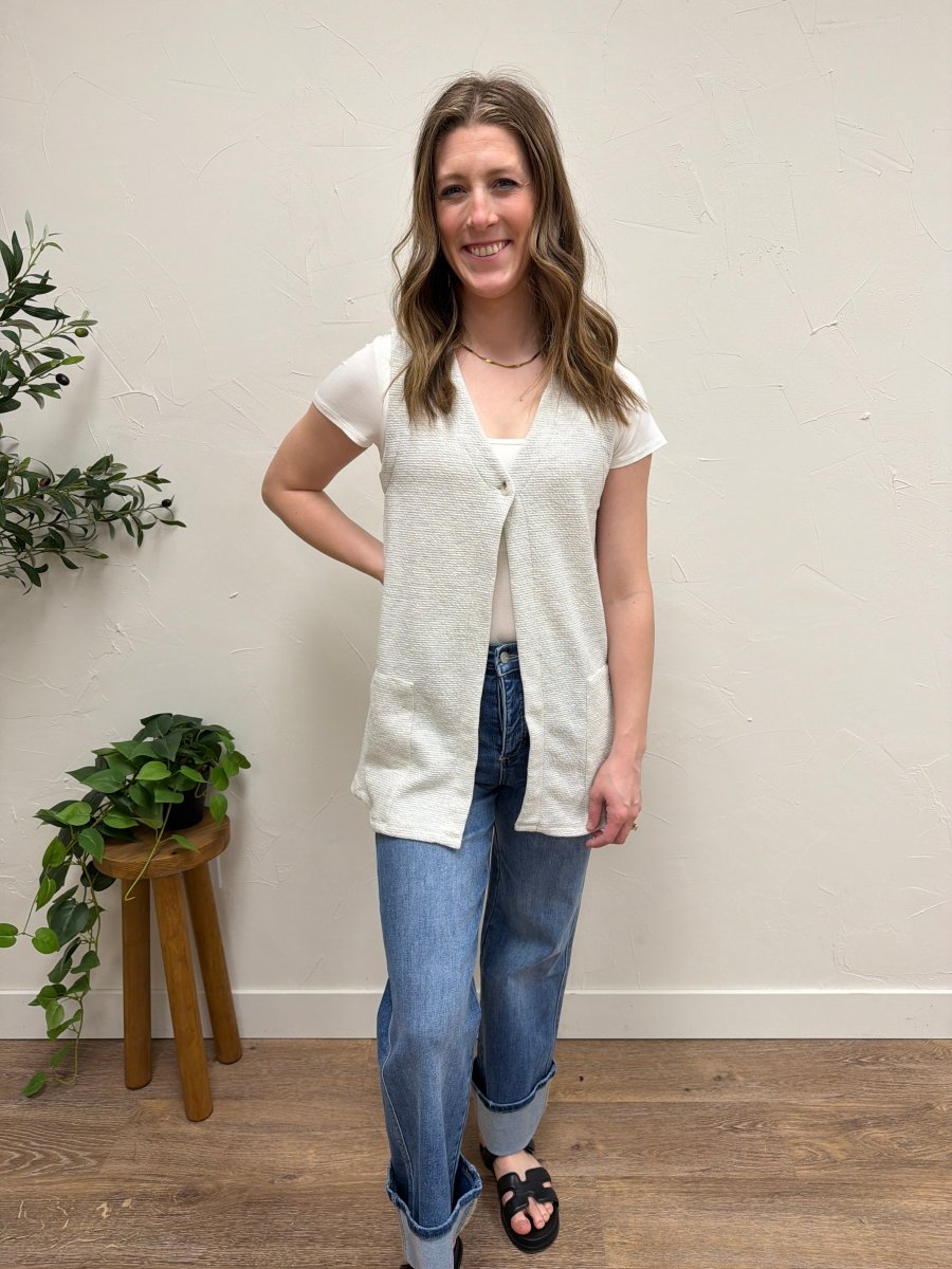 Lifestyle shot of model wearing tunic top styled with casual outfit — Three:Twelve Boutique