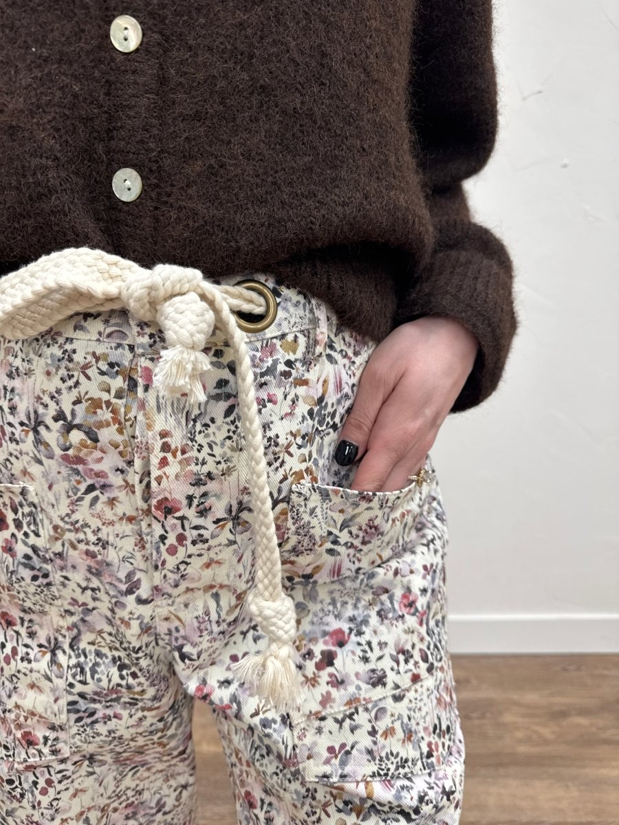 Close up of floral print fabric and rope string waistband detail — Three:Twelve Boutique