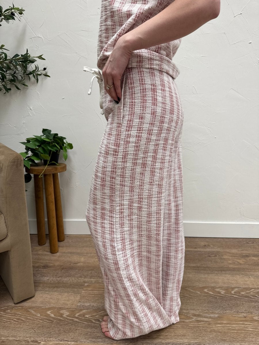 Side angle view of Zaria pants showing wide-leg drape and flow — Three:Twelve Boutique