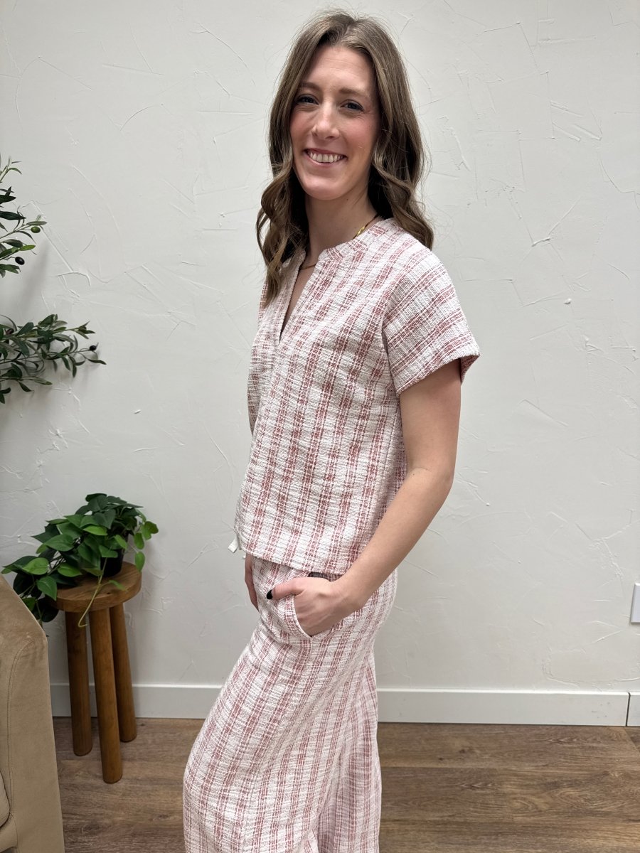 Side view of Zaria Top on model showing drape and sleeve detail — Three:Twelve Boutique